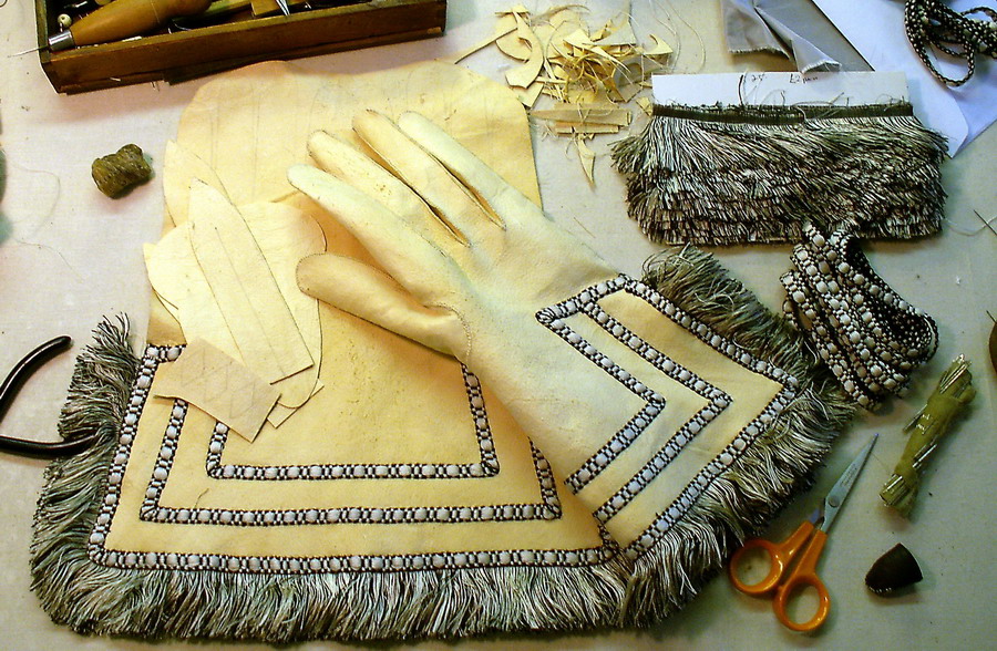 Fringed gloves being made